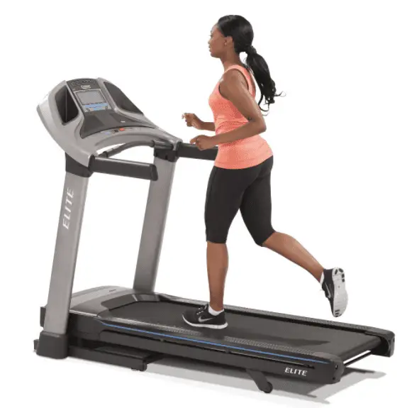 Woman doing some exercise with the horizon treadmill