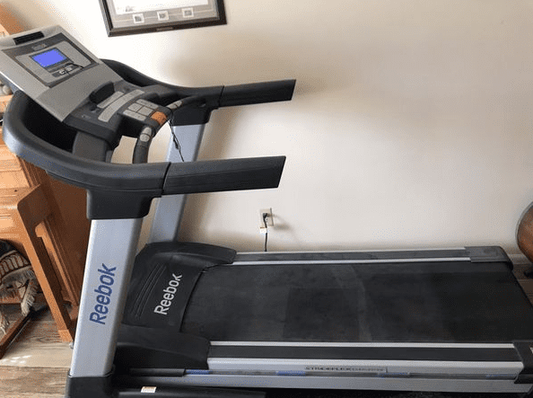 Black and gray Reebok Treadmill Intermix Acoustics 5.5